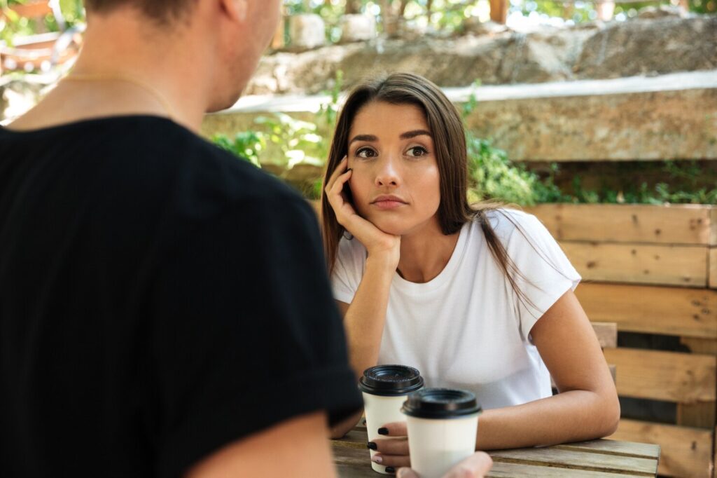 young woman looking bored